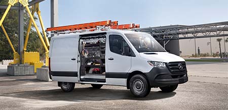 a Mercedes-Benz van that is upfitted for a builder.