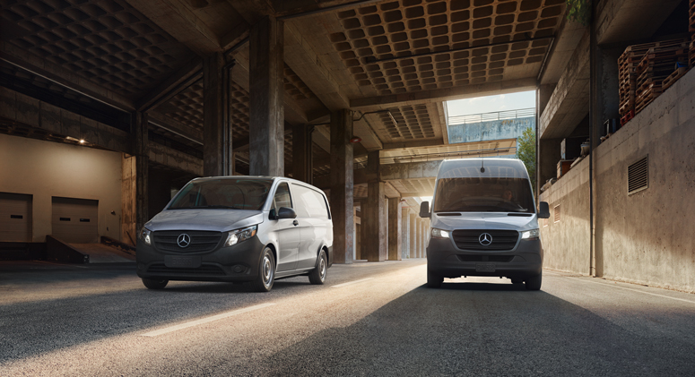 Two Mercedes-Benz vans in a warehouse.