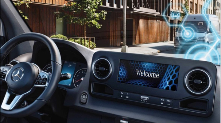 Interior view of the Mercedes-Benz Sprinter showing the touchscreen used for infotainment and Mercedes me connect services.  