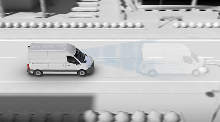 Showcasing the innovative Active Brake Assist safety feature in a Mercedes-Benz Cargo Van. 