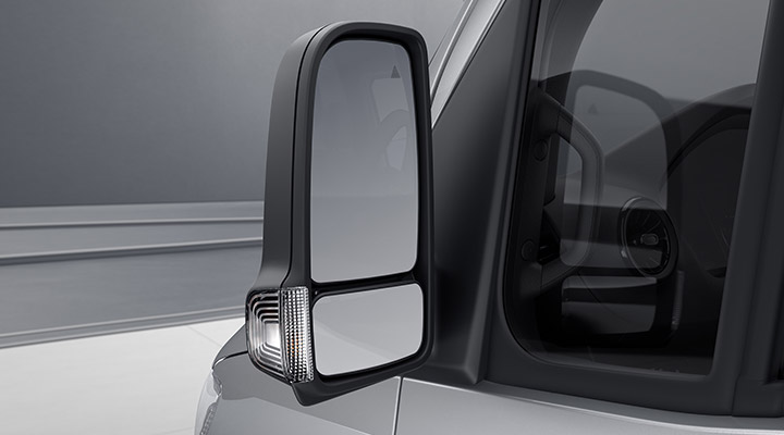 Heated and electrically adjustable exterior mirrors