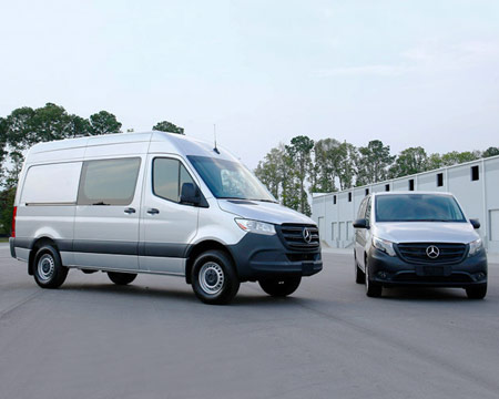 Sprinter and Metris Vans in a parking lot, ready to be upfit.